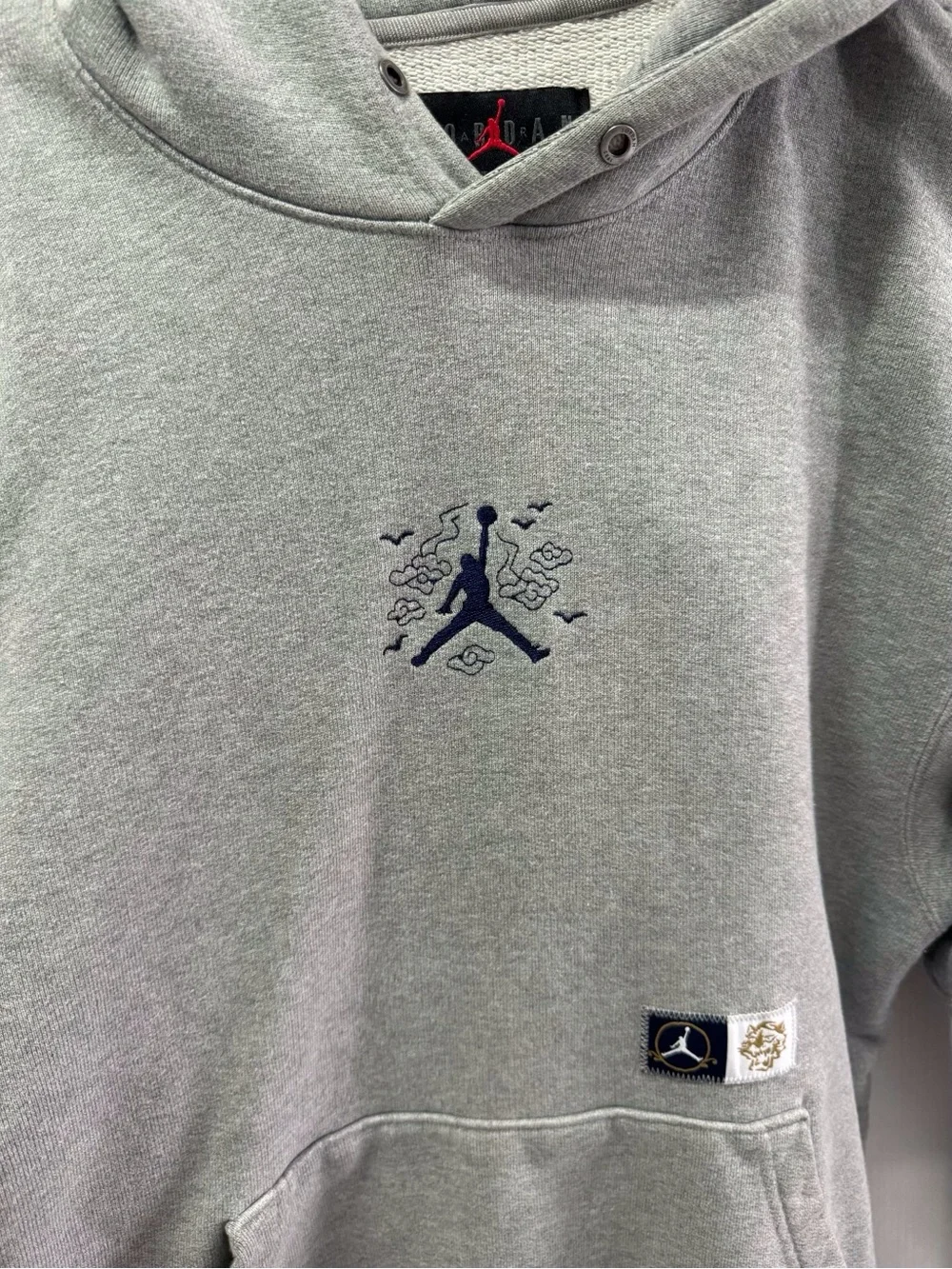 Jordan Light Gray Hoodie with Navy Jumpman Embroidery